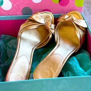 Coach golden heels